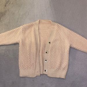 Fuzzy pink and white Chevron print sweater.